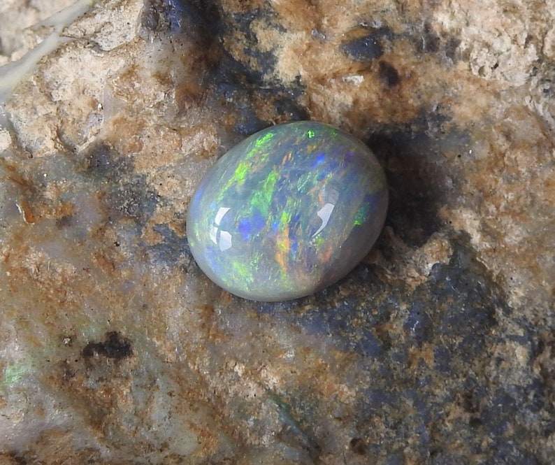 Natural Solid Polished Black Opal from Lightning Ridge with Multi-Color Fires.