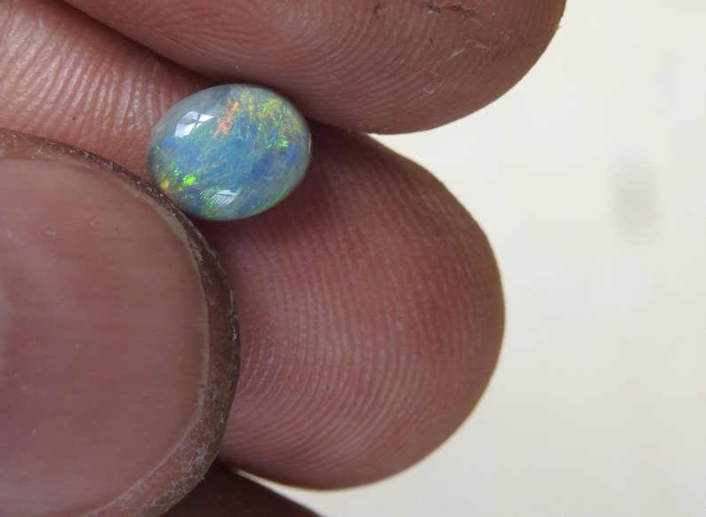 Natural Solid Polished Black Opal from Lightning Ridge with Multi-Color Fires.