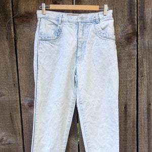 80s vintage Jordache jeans 29 / acidwash perforated thrashed high rise waist mom jeans blue cotton chambray light wash retro hipster glam