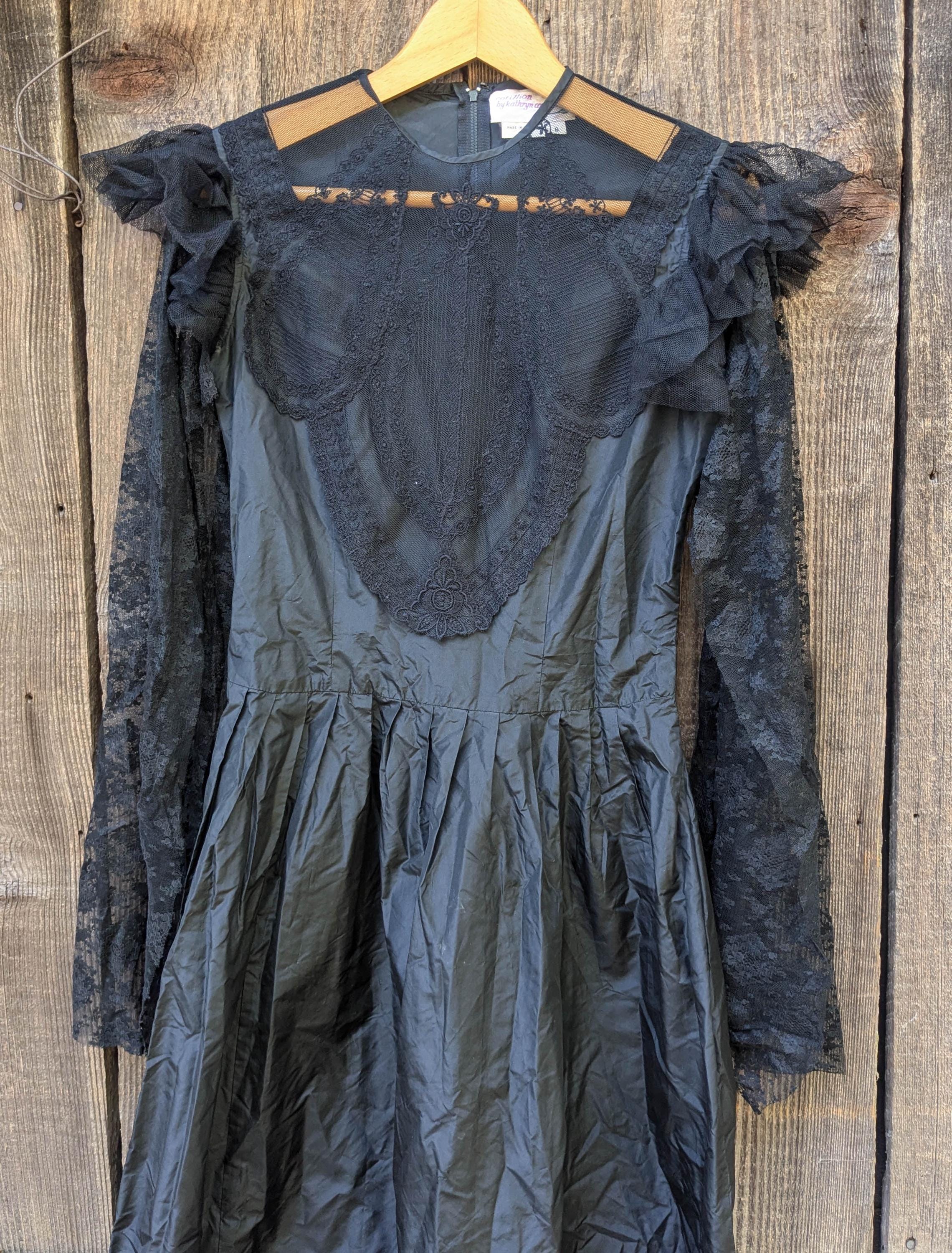 80s goth prom dress Living out my 80's goth fantasy in this black and blue ensemble This insane 80's prom dress has everything you could ask for: lace, polka dots, ruffles, sparkle, and a big