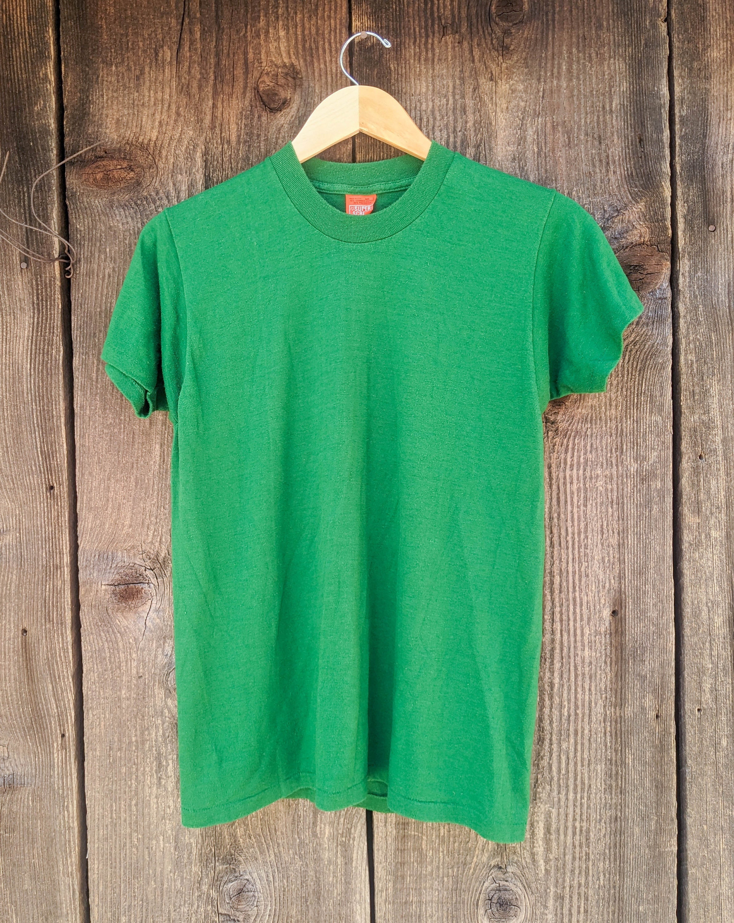 Kelly green tshirt Vectors & Illustrations for Free Download