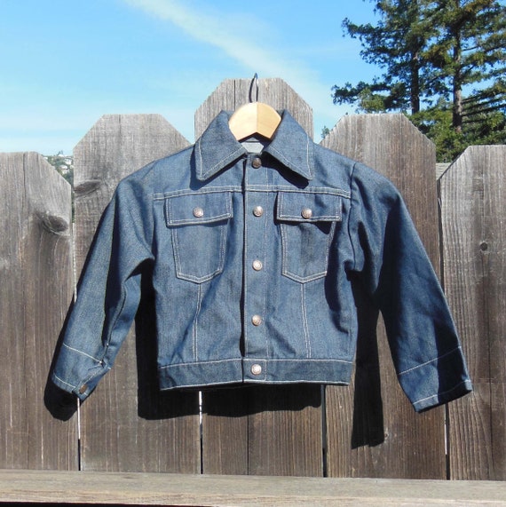 denim jacket with white stitching