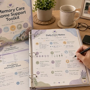 May include: A Memory Care Home Support Toolkit binder and related materials are displayed on a wooden surface. The binder is lavender and white, with the title "Memory Care Home Support Toolkit." A person is writing on a "Daily Care Notes" page.