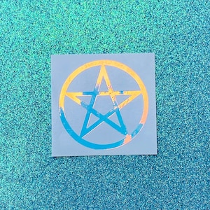 May include: A square sticker featuring a pentagram symbol enclosed within a circle. The design displays a gradient color effect transitioning from orange and yellow tones at the top to blue and teal shades at the bottom, set against a light gray background.