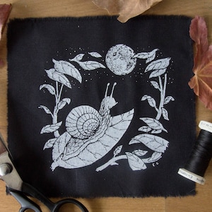 Parche de caracol y luna