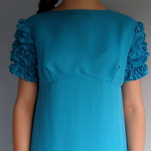 1960s vintage full-length peacock blue bridesmaid dress, in a regency style