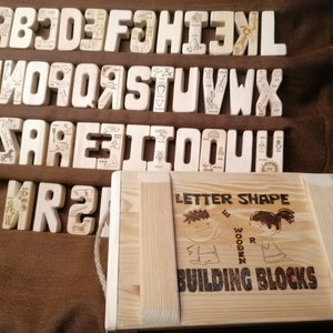 Bloques de construcción con forma de letras