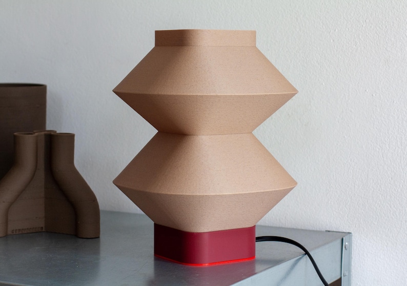Wooden Desk Lamp Eco Friendly Design Biodegradable Material Oak Wood Accent Reading Light Ambient Lighting Bedroom Decor Table Lamp Contemporary Style Midcentury Modern Aesthetic Sustainable Home Product Rippled Texture Detail Unique