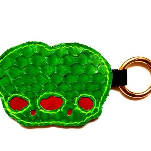 Keychain siamese twin skull