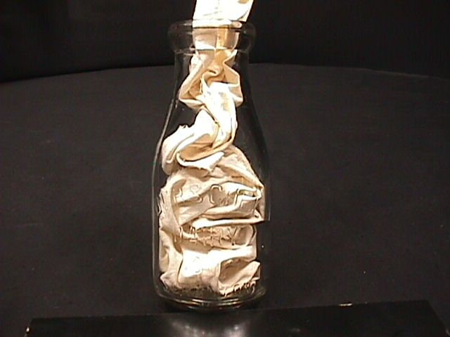 An Antique One Pint Milk Bottle from The Burschel Dairy Co