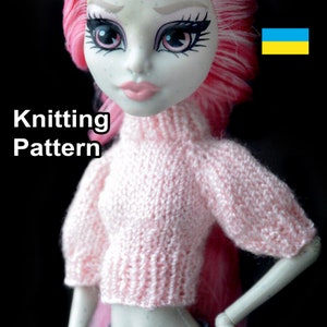 May include: Knitting pattern for a pink doll sweater with a turtleneck. The pattern includes the text "Knitting Pattern".