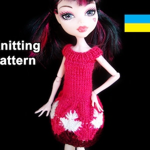 May include: Knitting pattern for a red dress with white accents. The dress is being worn by a doll with black and pink hair. The text "Knitting Pattern" is visible in the image. The Ukrainian flag is also visible in the image.