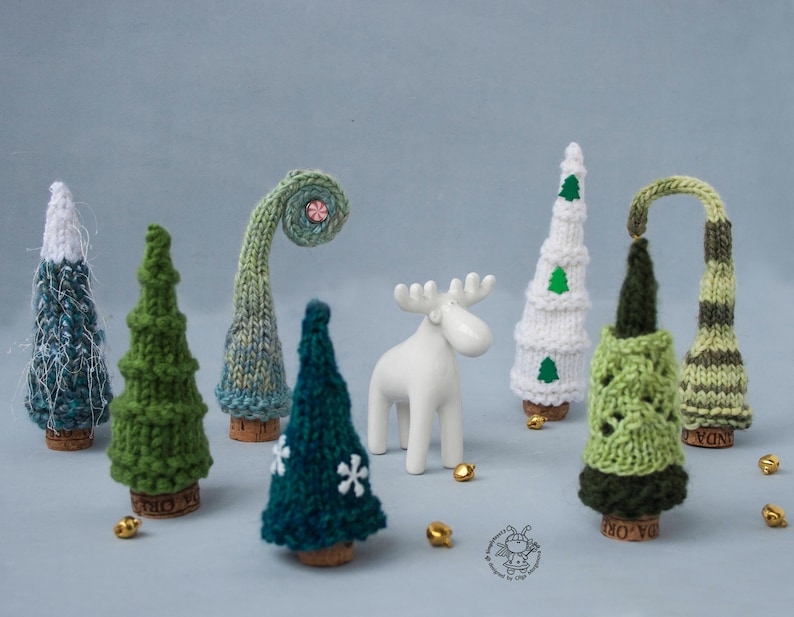 7 tiny Christmas tree ornaments knitted flat but with final 3d look
