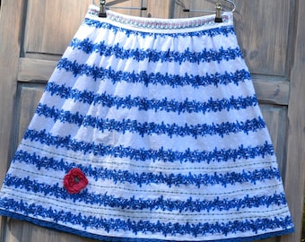 Romantic white cotton skirt with blue flowers