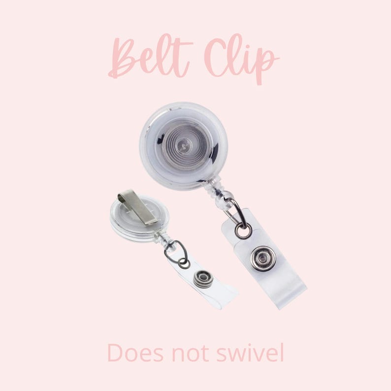 May include: A clear retractable badge holder with a belt clip. The holder has a silver metal clip and a clear plastic strap. The text "Does not swivel" is printed below the holder.