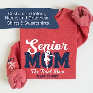 May include: Red sweatshirt featuring the text "Senior MOM" in white and navy blue, with a ballerina graphic. The words "The Final Bow" and "CLASS OF 2027" are also visible. The sleeve has the word "ACE" and a ballet shoe graphic. The top banner says "Customize Colors, Name, and Grad Year Shirts & Sweatshirts."