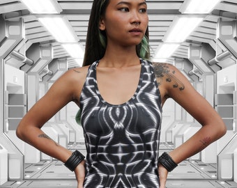 May include: A black and white patterned sleeveless mini dress with a scoop neck.
