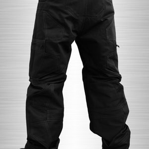 May include: Black cargo trousers with multiple pockets and a straight leg fit.