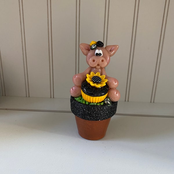 Polymer Clay Pig sitting in a Fall Flowerpot