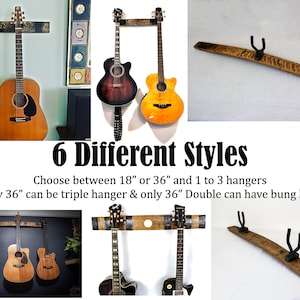 Extensive collection of whiskey barrel stave guitar hangers in a range of styles and sizes, featuring 18-inch models with one or two hooks, 36-inch versions with one, two, or three hooks, and a distinctive 36-inch double hook hanger with a bung hole.