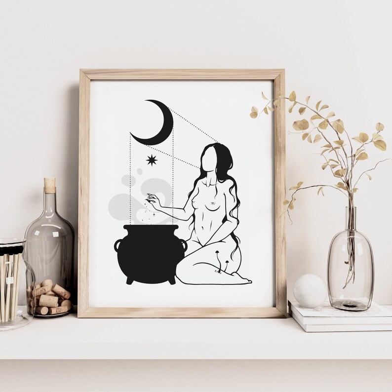 May include: Black and white line art print of a woman sitting beside a cauldron with a crescent moon and stars in the background.