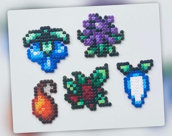 Objetos de invierno recolectados en Stardew Valley: mini cuentas Hama, decoración de pared, llavero, imán, adorno para pastel.