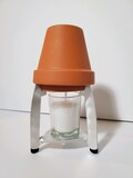 Single Votive Candle Flowerpot Heater.