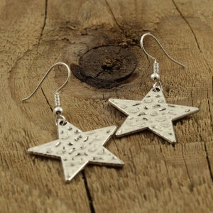 Hammered star earrings, silver star earrings, dangly star earrings, stars, silver star jewellery, star drop earrings, hammered star, gift
