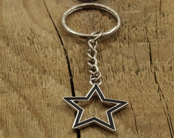 Llavero estrella, llavero estrella, llavero estrella negra, llavero estrella plata, llavero estrella plata, llavero estrella negra, estrella, llavero celestial