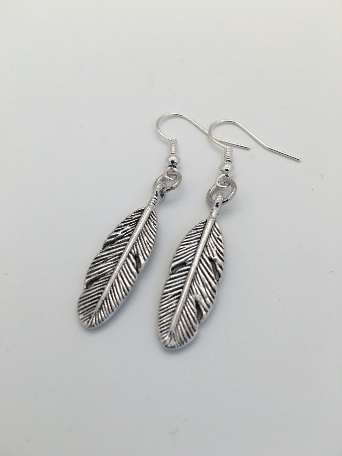 Feather Earrings With Charms