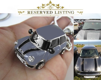 Customized for BEGUM ,  mini car white gold Keychain , all Graphite Grey color of  body and roof, black stripes , Customized number plate