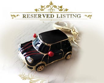 Custom mini car color,all black with red side mirrors and red pin stripes on front mini car keychain, grade crystal, gold car,luxury gift
