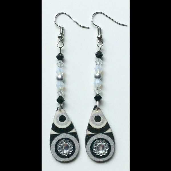 Black and white curls, matching swarovski spinning tops, geometric pattern