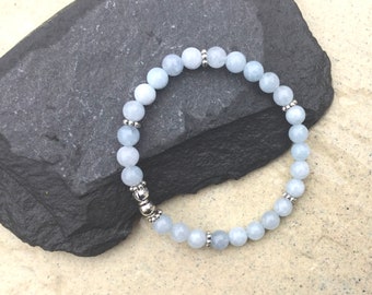 Bracelet perles pierre aigue marine, intercalaires argentés, elastiqué