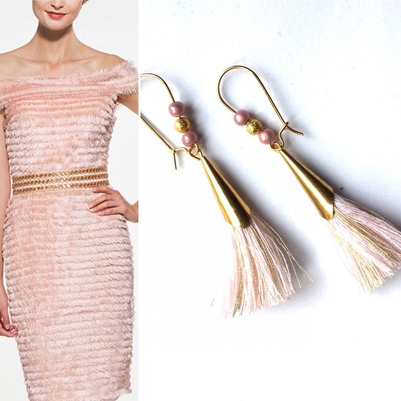golden and pink earrings pink pompom