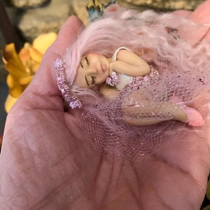 Teeny tiny life-like fairy sculpture,  Cotton Candy. A perfect item for any fairy lover!