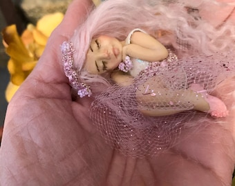 Teeny tiny life-like fairy sculpture,  Cotton Candy. A perfect item for any fairy lover!