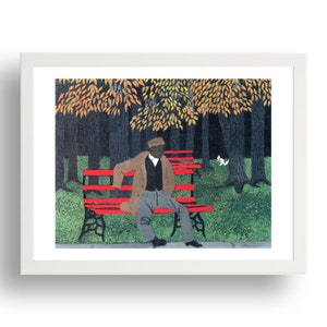 May include: A man wearing a brown coat and a hat sits on a red bench in a park. The trees in the background have yellow and orange leaves.