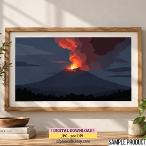 Puede incluir: Una impresión de arte digital enmarcada que representa una erupción volcánica nocturna. La escena muestra la silueta oscura de una montaña contra un cielo azul profundo, con lava naranja y roja brillante en la cima y humo espeso.