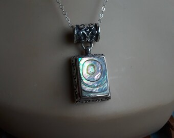 Sterling silver ornate design mother of pearl shell pendant