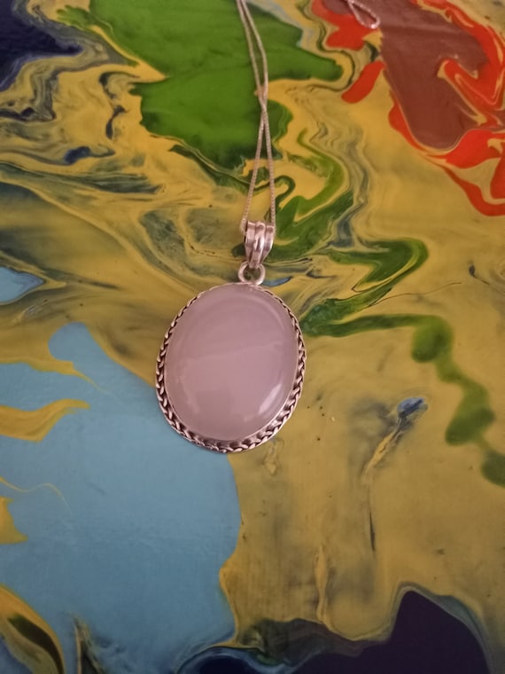 Sterling Silver oval rose quartz pendant with ster