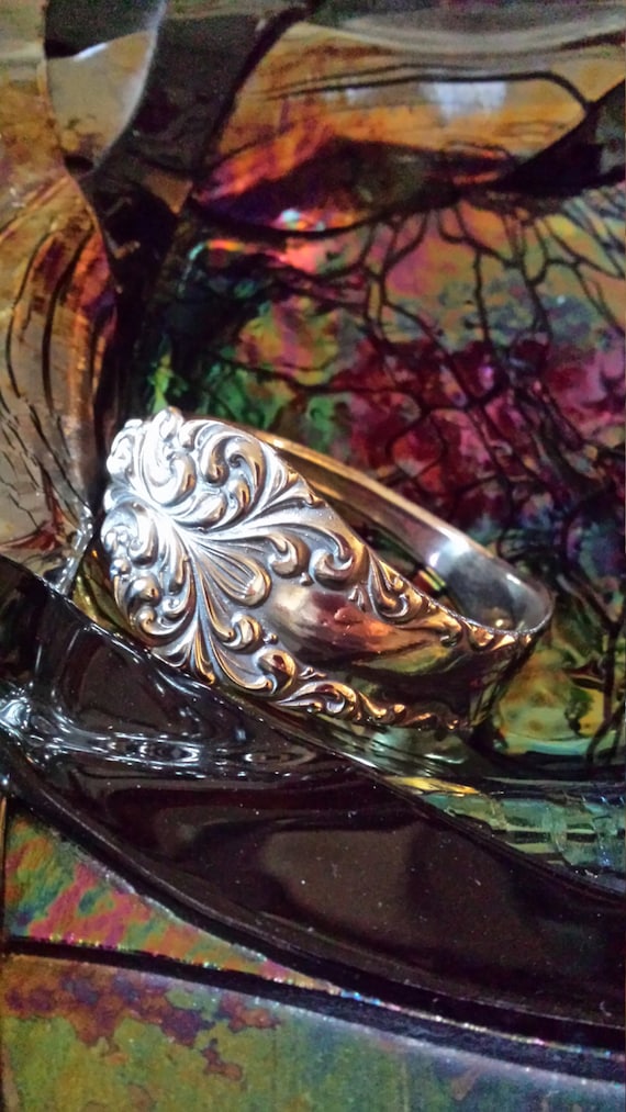 Sterling silver scrolling solid bangle