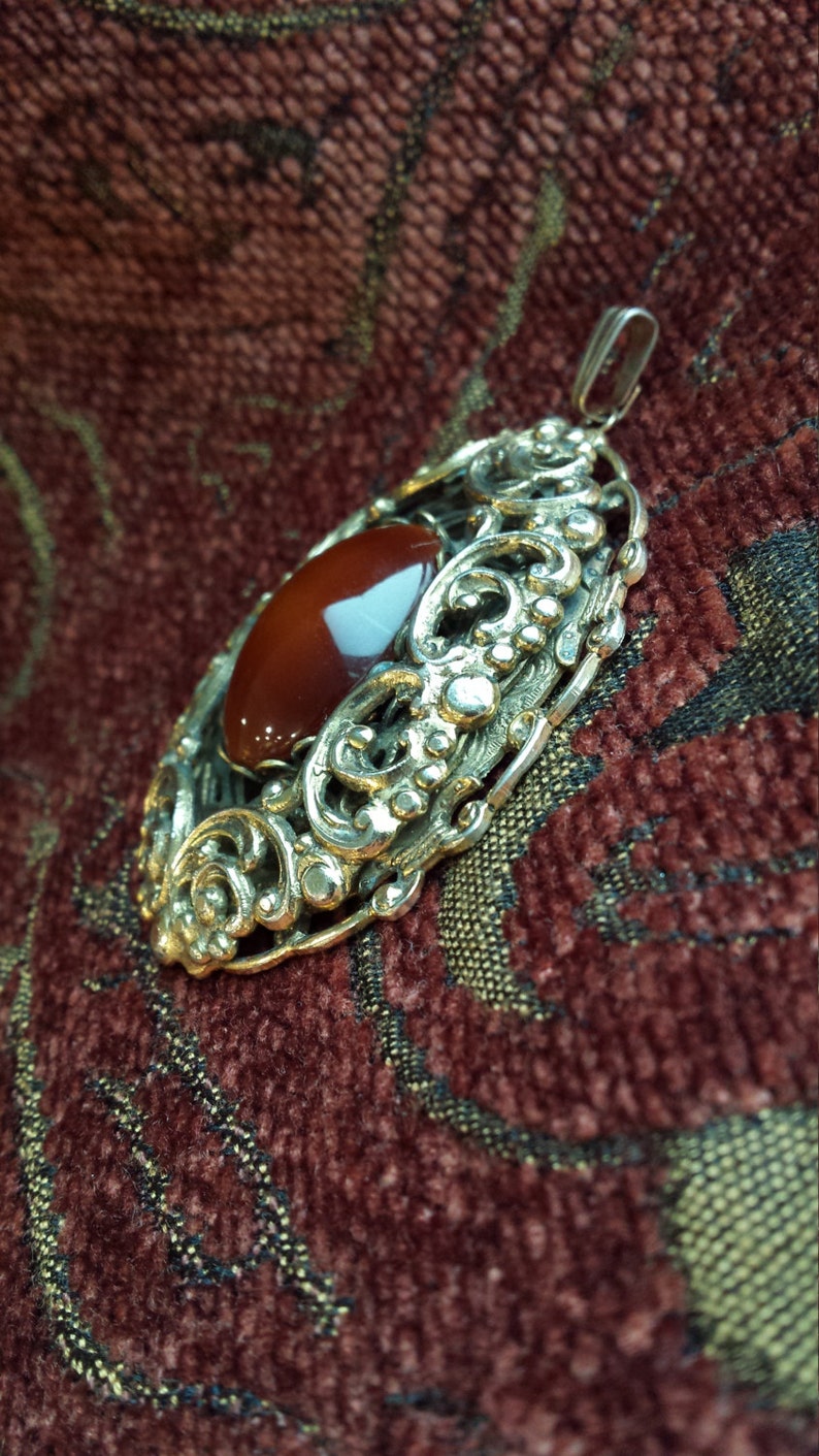 Vintage gold toned pendant
