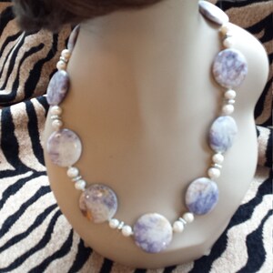One strand necklace made with freshwater pearl and flat beaded amythyst