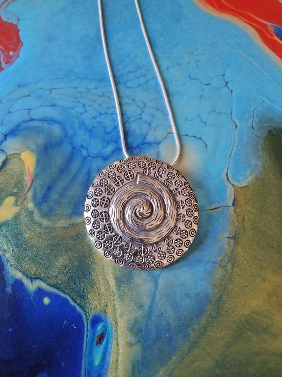 Sterling Silver round swirl pendant with Sterling Silver chain