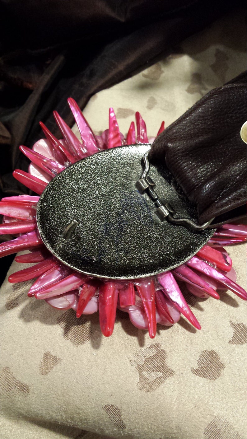 belt buckle made with shell and vintage jewelry
