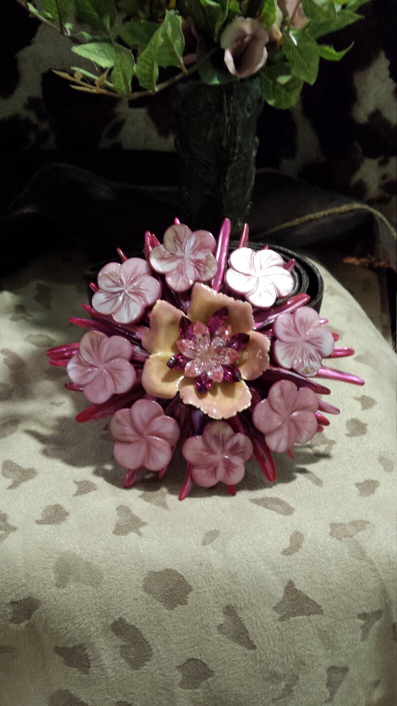 belt buckle made with shell and vintage jewelry