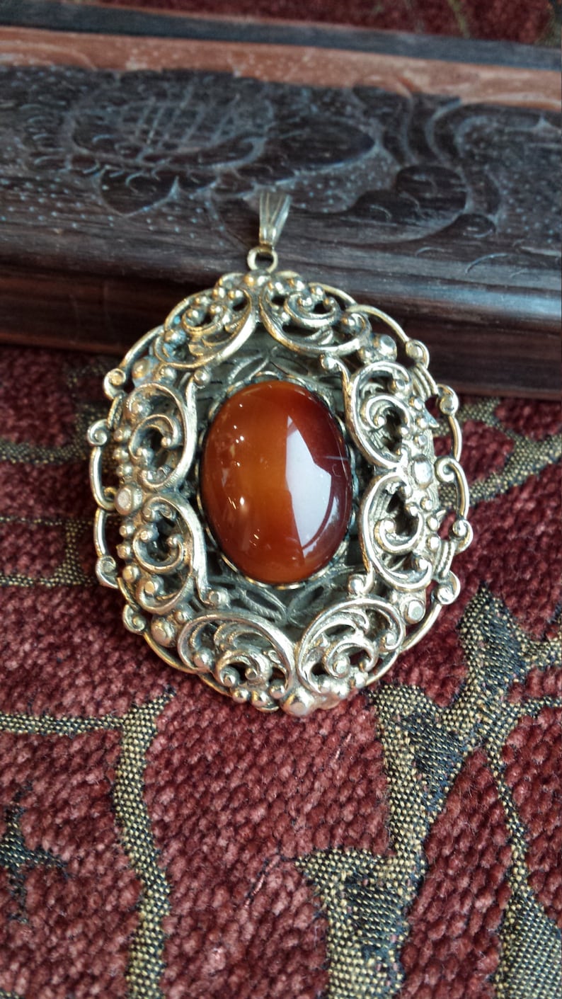Vintage gold toned pendant