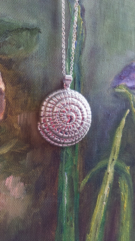 Sterling silver shell pendant with sterling silver