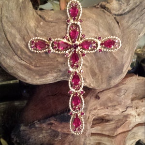 Hobe gold cross with red faceted stones